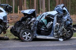 Traffic accident involving severely damaged cars.